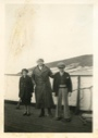 Image of white woman and 2 children aboard Thebaud